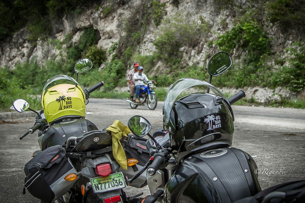 MEN RIDING MOTORCYCLE