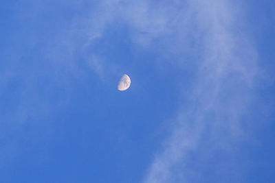 Low angle view of moon in sky