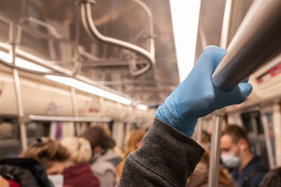 Rear view of people at train