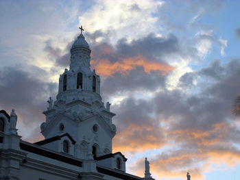 High section of building against cloudy sky