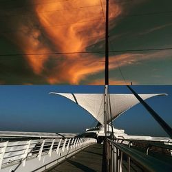 Low angle view of built structure against sky at sunset