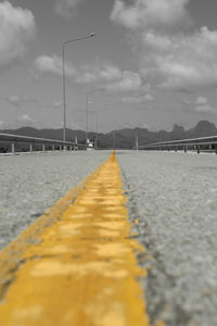 Surface level of street against sky