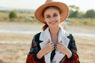 Portrait of woman wearing hat