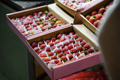 Fresh strawberries in boxes sold at a night market