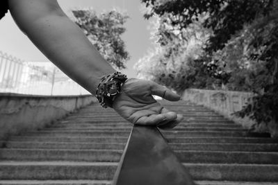 Midsection of woman on staircase