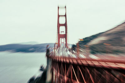 Blurred motion of bridge against sky