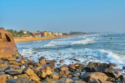 Scenic view of sea against clear blue sky