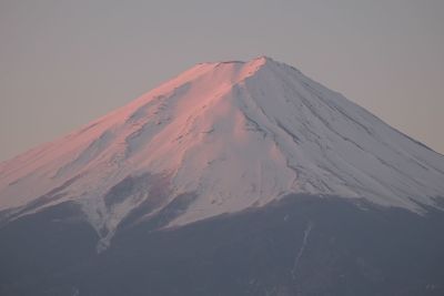 Scenic view of snowcapped mountain against sky