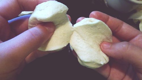 Close-up of hand holding ice cream