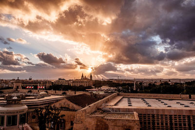 High angle view of townscape against sky at sunset