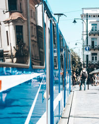 People walking on street in city