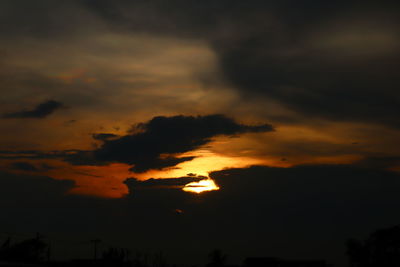 Low angle view of dramatic sky during sunset