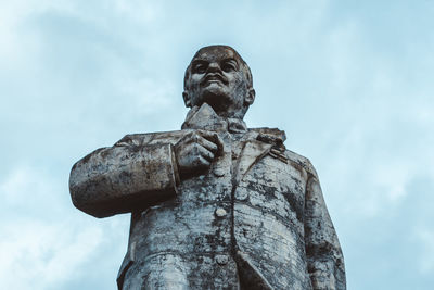 Low angle view of statue against sky