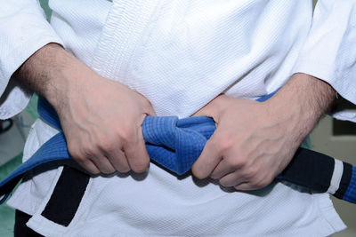 Close-up of person in martial arts uniform