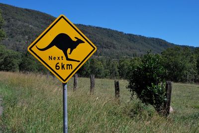 Road sign on a field