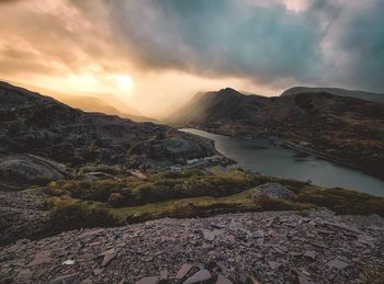 Scenic view of mountains against sky during sunset