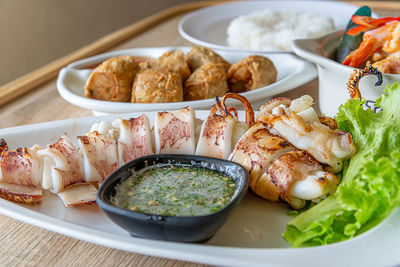 Close-up of food in plate on table