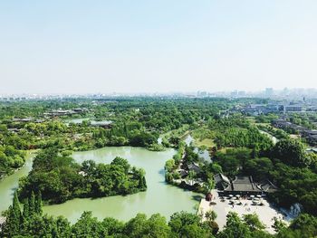 High angle view of trees and buildings against sky