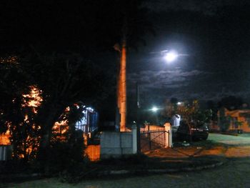 Illuminated street light at night