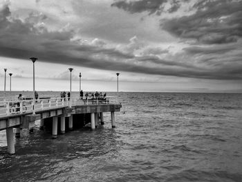 Scenic view of sea against cloudy sky