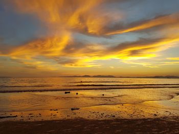 Scenic view of sea against orange sky