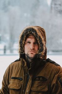 Portrait of man in snow