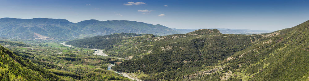 Panoramic view of mountains against sky