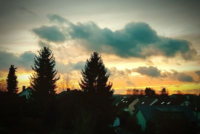 High angle view of silhouette trees against sky during sunset