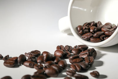 Close-up of coffee beans on table