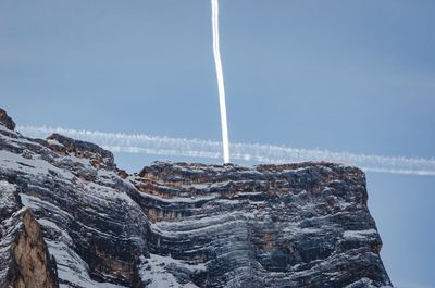 Low angle view of vapor trail against sky