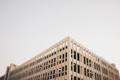 Low angle view of buildings against clear sky