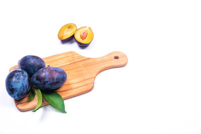 High angle view of fruits against white background