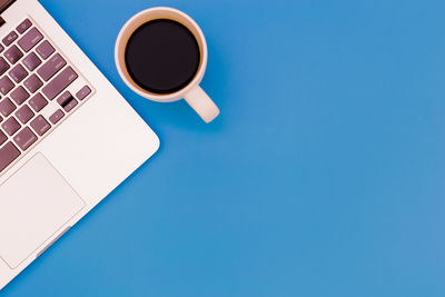 High angle view of coffee cup on table