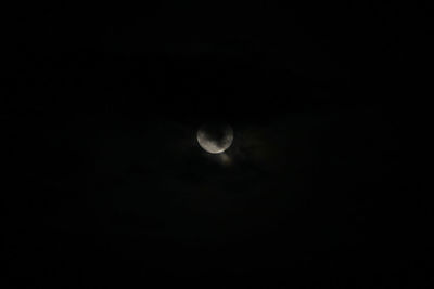 Scenic view of moon against sky at night