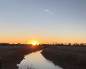 Scenic view of silhouette landscape against sky during sunset