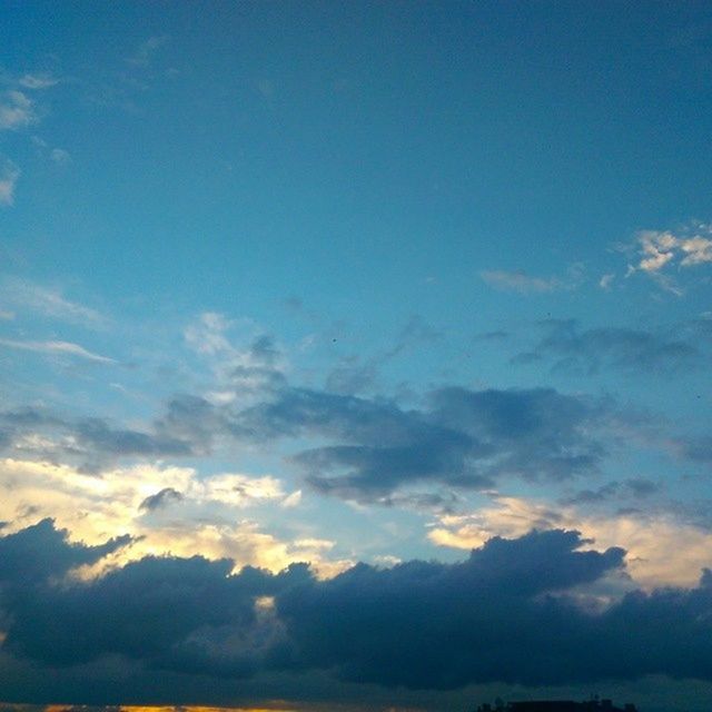 sky, beauty in nature, scenics, tranquility, cloud - sky, tranquil scene, low angle view, blue, nature, sky only, cloudscape, idyllic, cloud, cloudy, majestic, silhouette, outdoors, sunset, no people, backgrounds