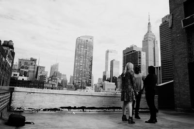 Woman standing in city