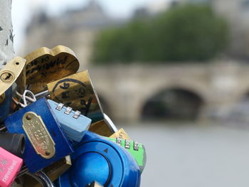 Close-up of padlocks on metal chain