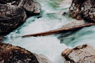 Scenic view of sea against rock formation