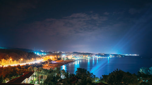 High angle view of illuminated city at night