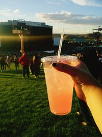 Close-up of hand holding drink