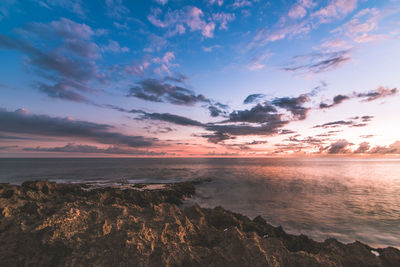 Scenic view of sea against sky during sunset