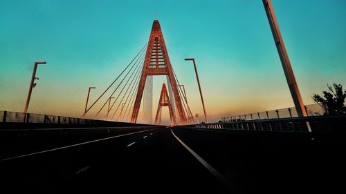 Suspension bridge at sunset