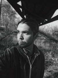 Portrait of young man looking away