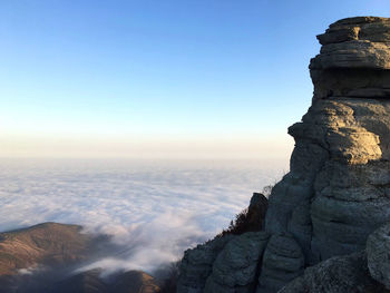 Scenic view of rock formation against clear blue sky