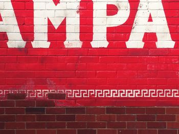 Information sign on brick wall