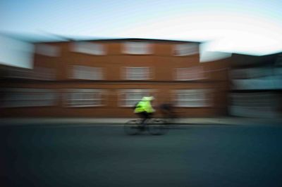 Blurred motion of man against the sky
