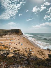 Scenic view of beach against sky