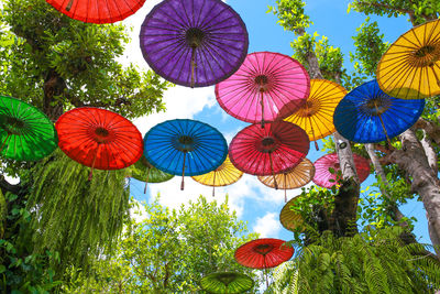 Low angle view of red umbrella