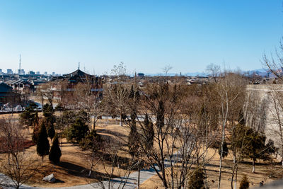 Panoramic view of cityscape against clear sky